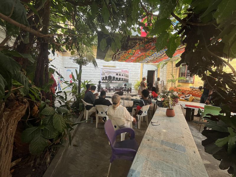 A talk in the Jamestown Café courtyard