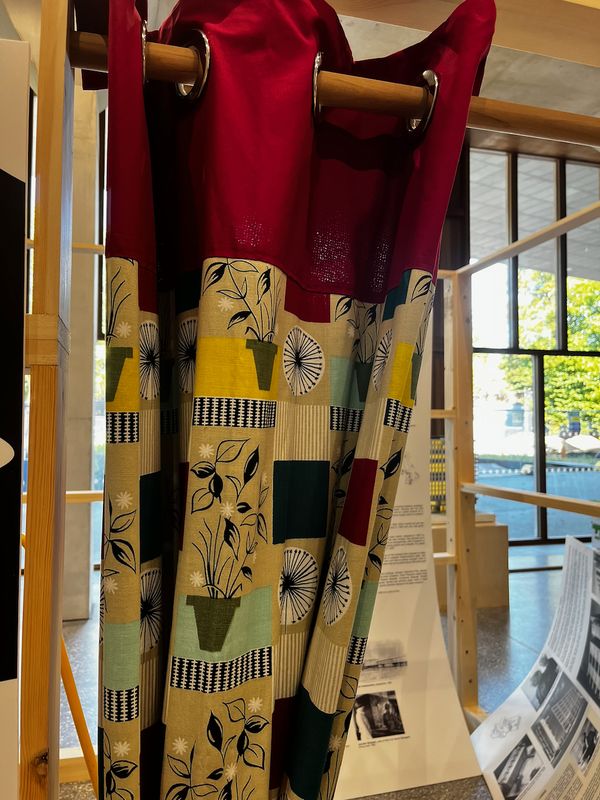Textile hung within a pavilion