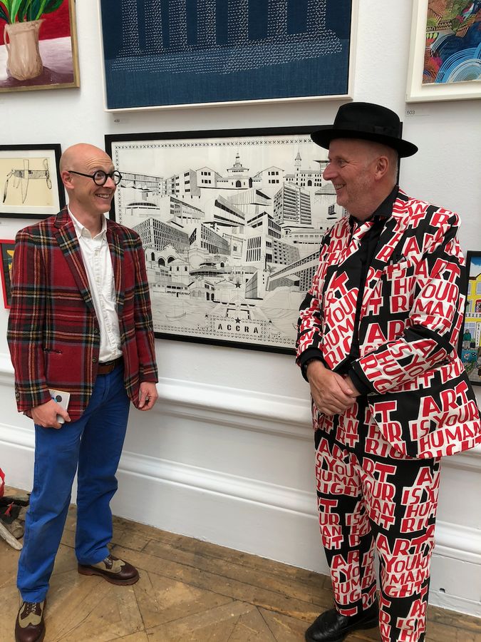 Iain Jackson (left) and Bob and Roberta Smith with the drawing at the Royal Academy Summer Exhibition, 2021
