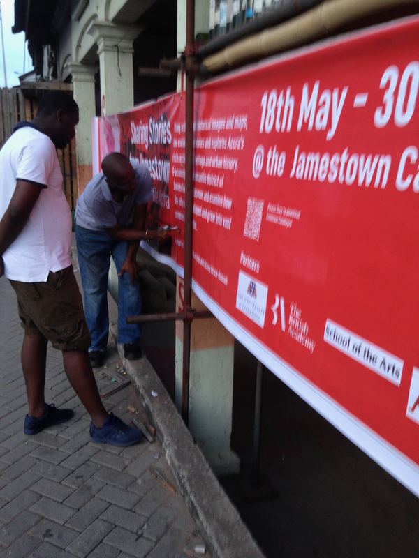 Putting up the street banner